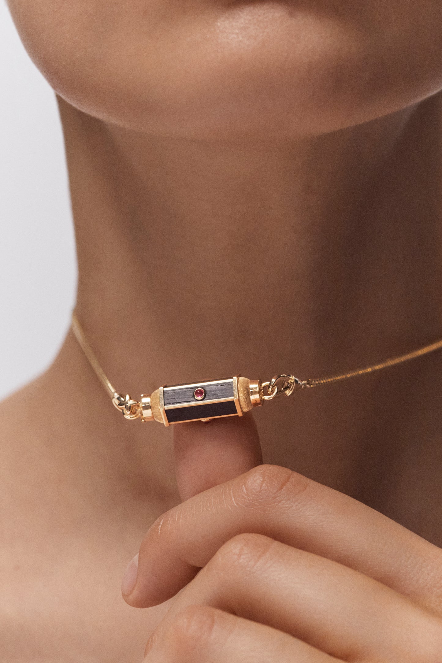 Ebony baby locket necklace