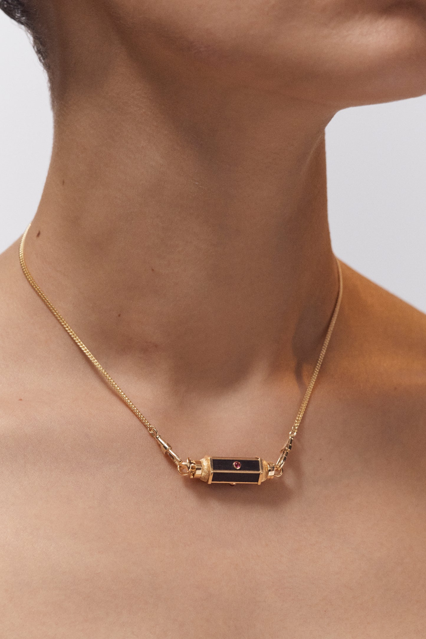 Ebony baby locket necklace