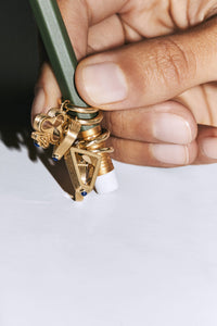 Marie Lichtenberg Staging Earring Baby charm Triangle earring