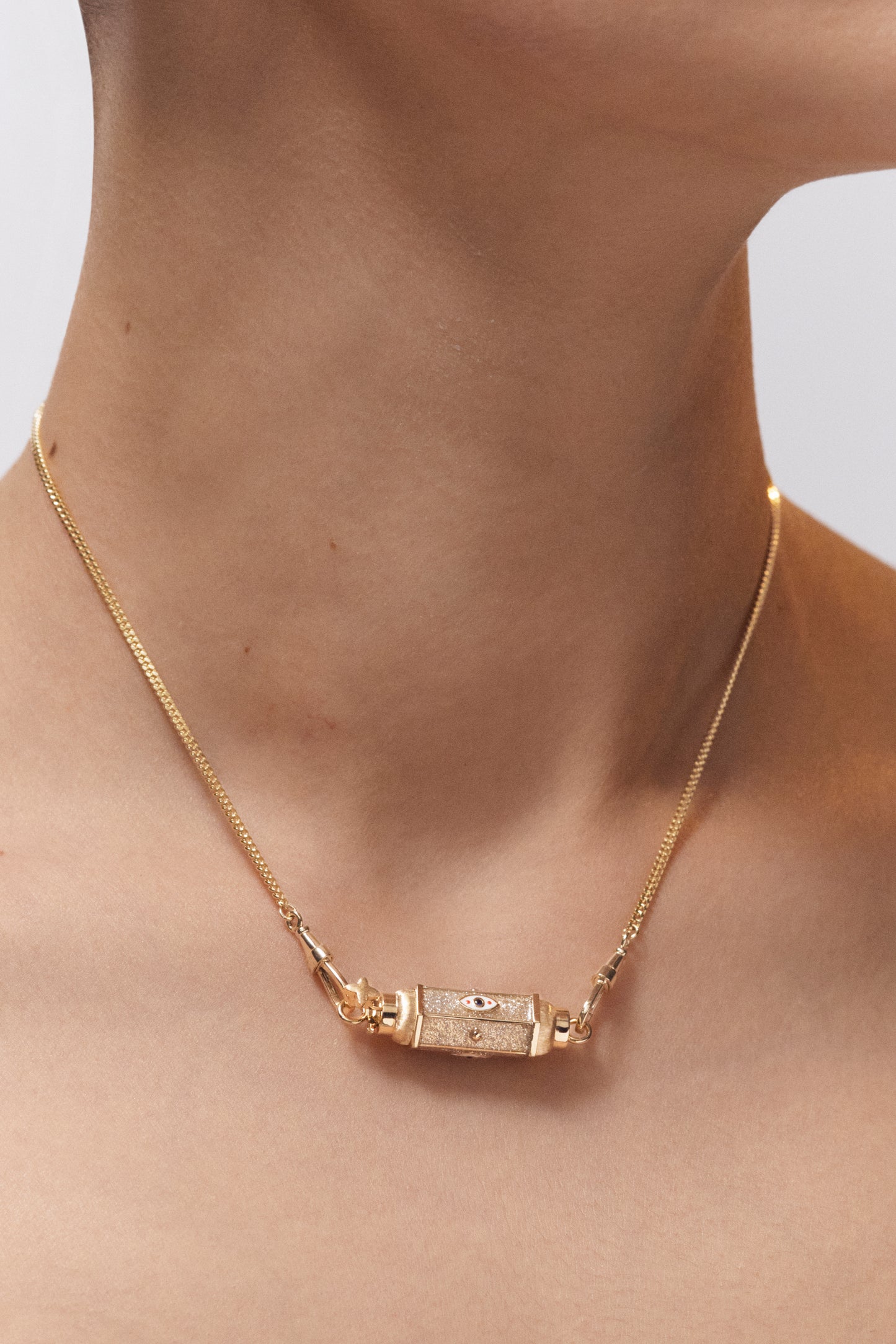 Marie Lichtenberg Staging Baby locket Evil Eye Gold Baby Locket Necklace