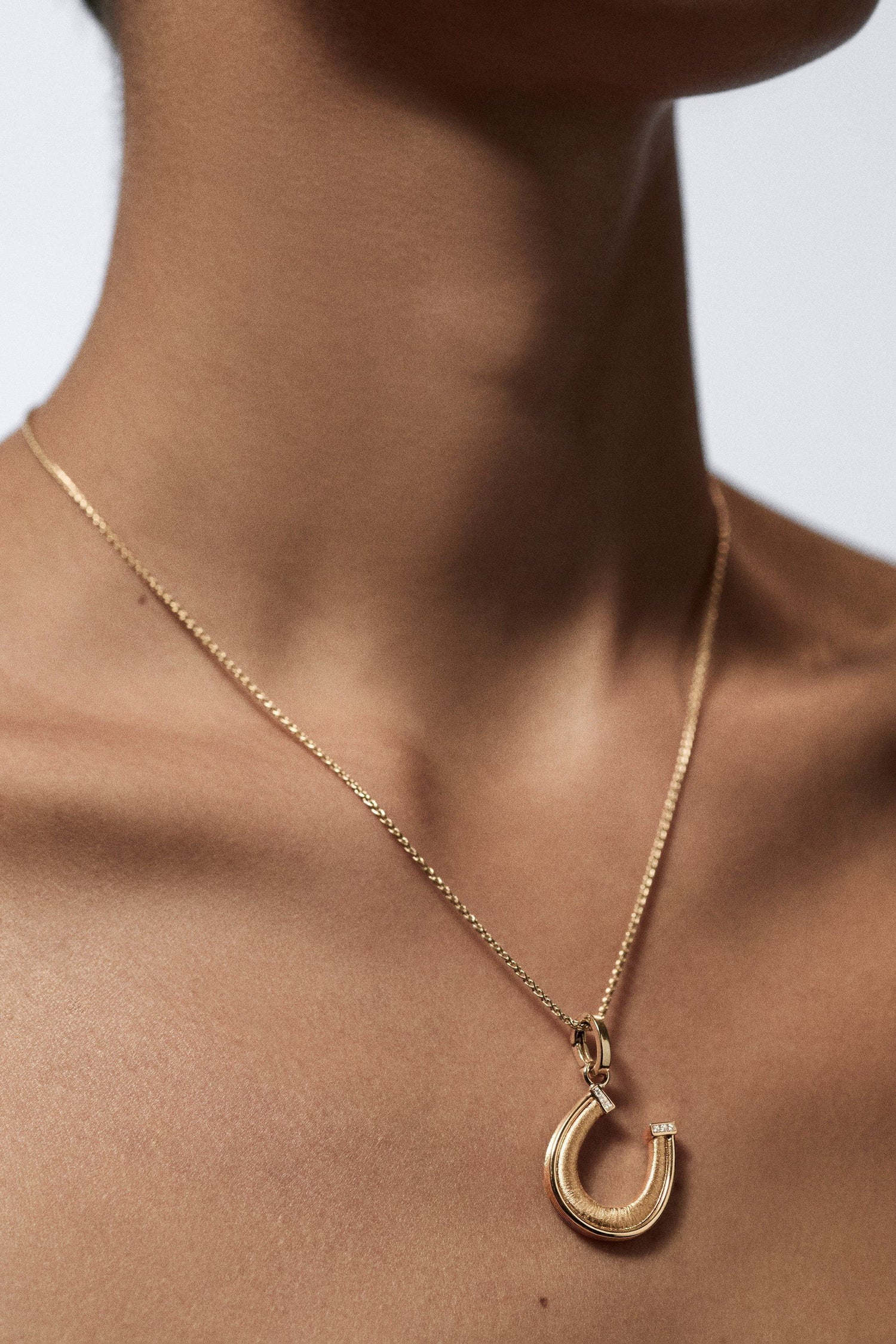 Marie Lichtenberg Staging Charm Horseshoe charm